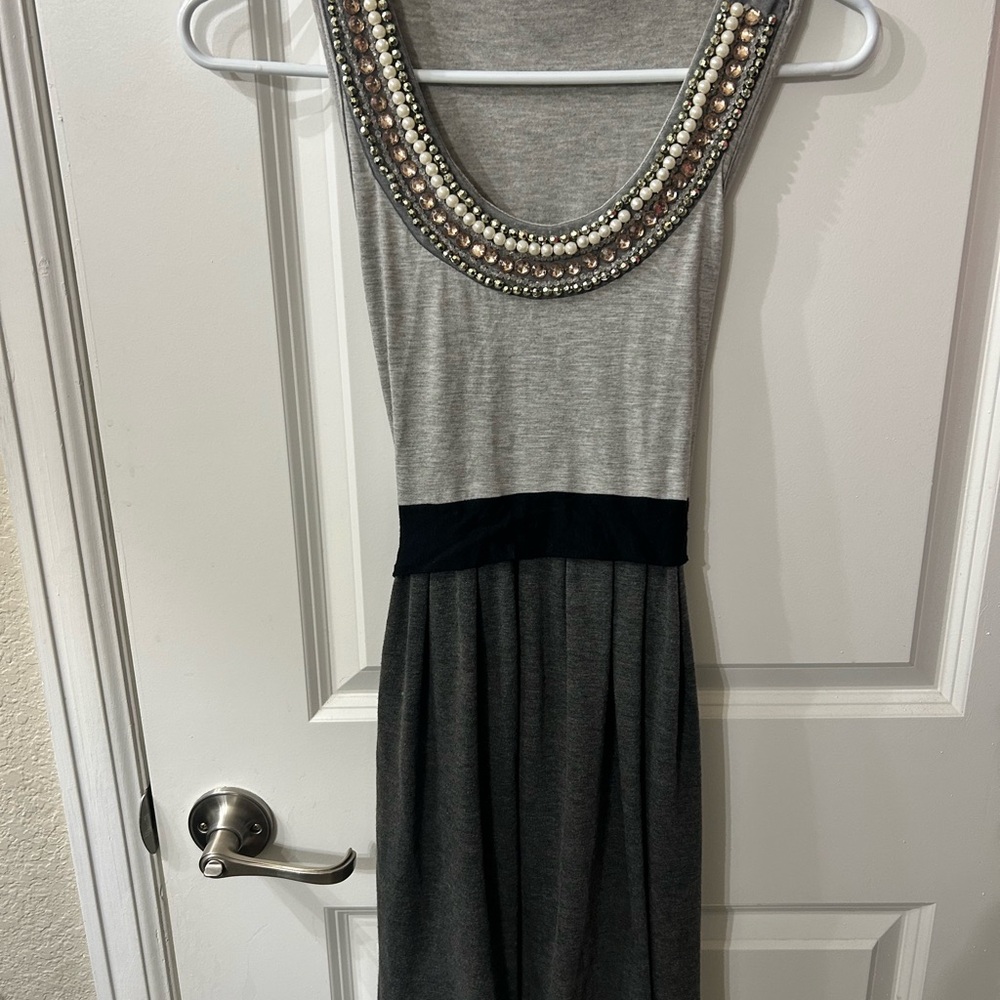 Elegant Gray Sleeveless Dress with Beaded Neckline